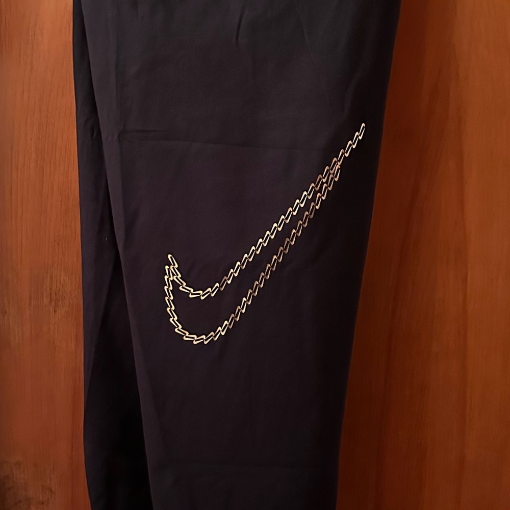 Nike Women’s Black Joggers with Gold Swoosh